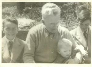 Left to right: Me, my father, my brother. My father is holding my niece Sandy.