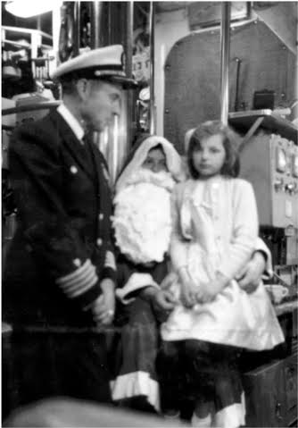 Capt Brooks, Dave Jenkins with little girl from Dunoon.