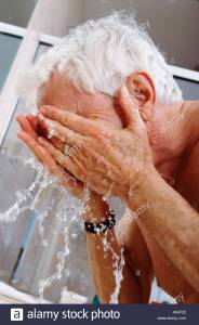 elderly-man-washing-his-face-A64F35
